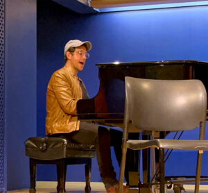 Photo of Santino Fontana performing for Broadway Rose patrons at the Opera Center of America in a special question and answer session with the Broadway star.